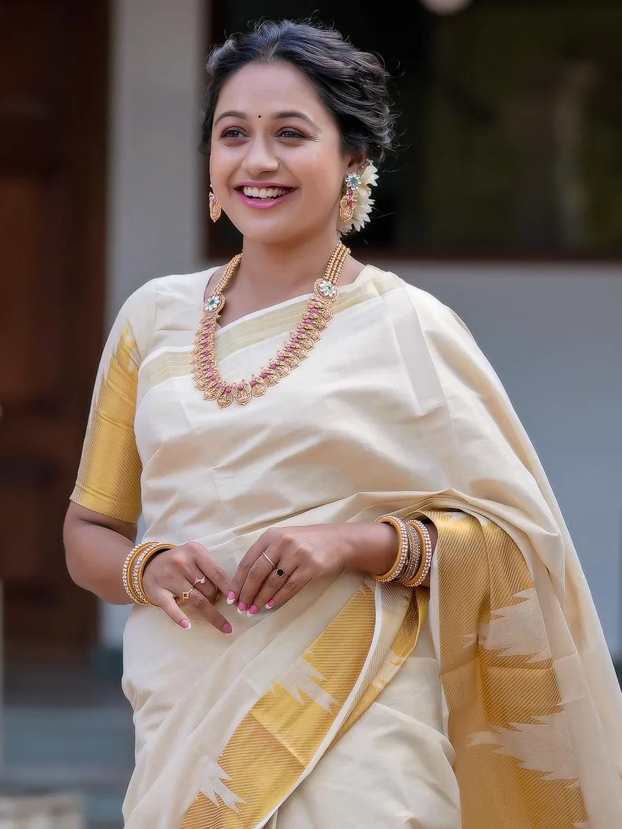 Temple Weave Golden Tissue Saree